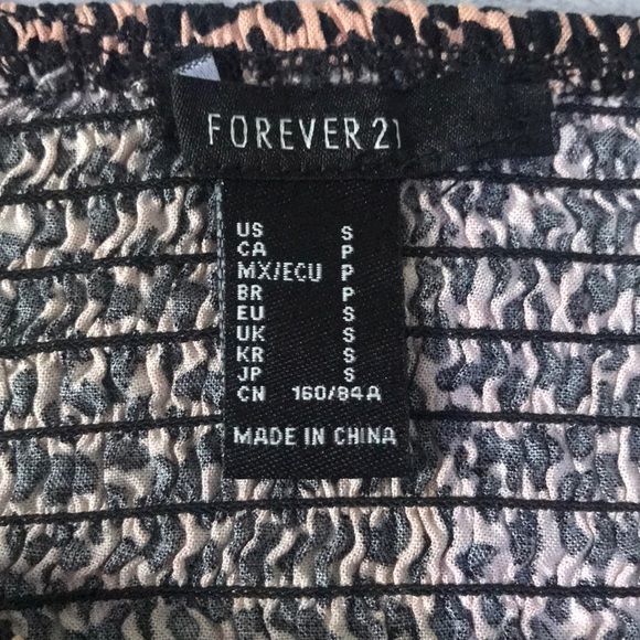 A cheetah print romper from forever21 - Picture 2 of 5